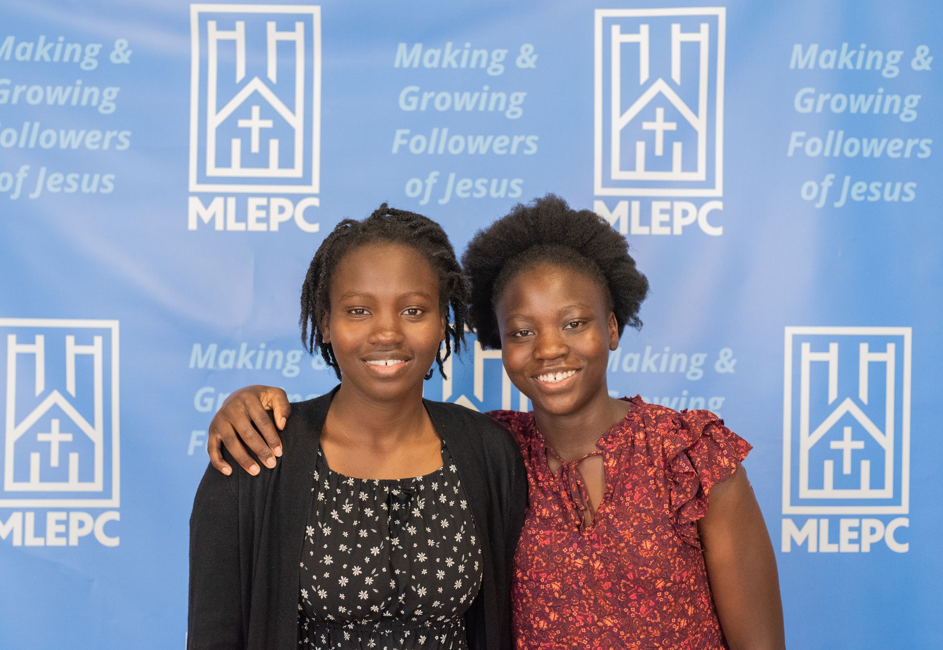 two teenagers at church event