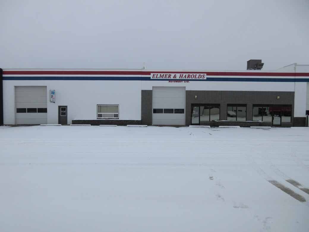 White building with red and blue stripe,
