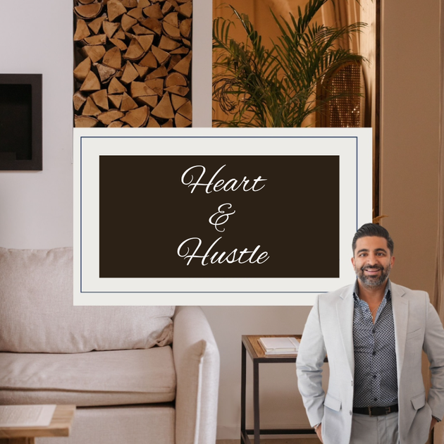 A man standing in front of a sign that says heart & hustle