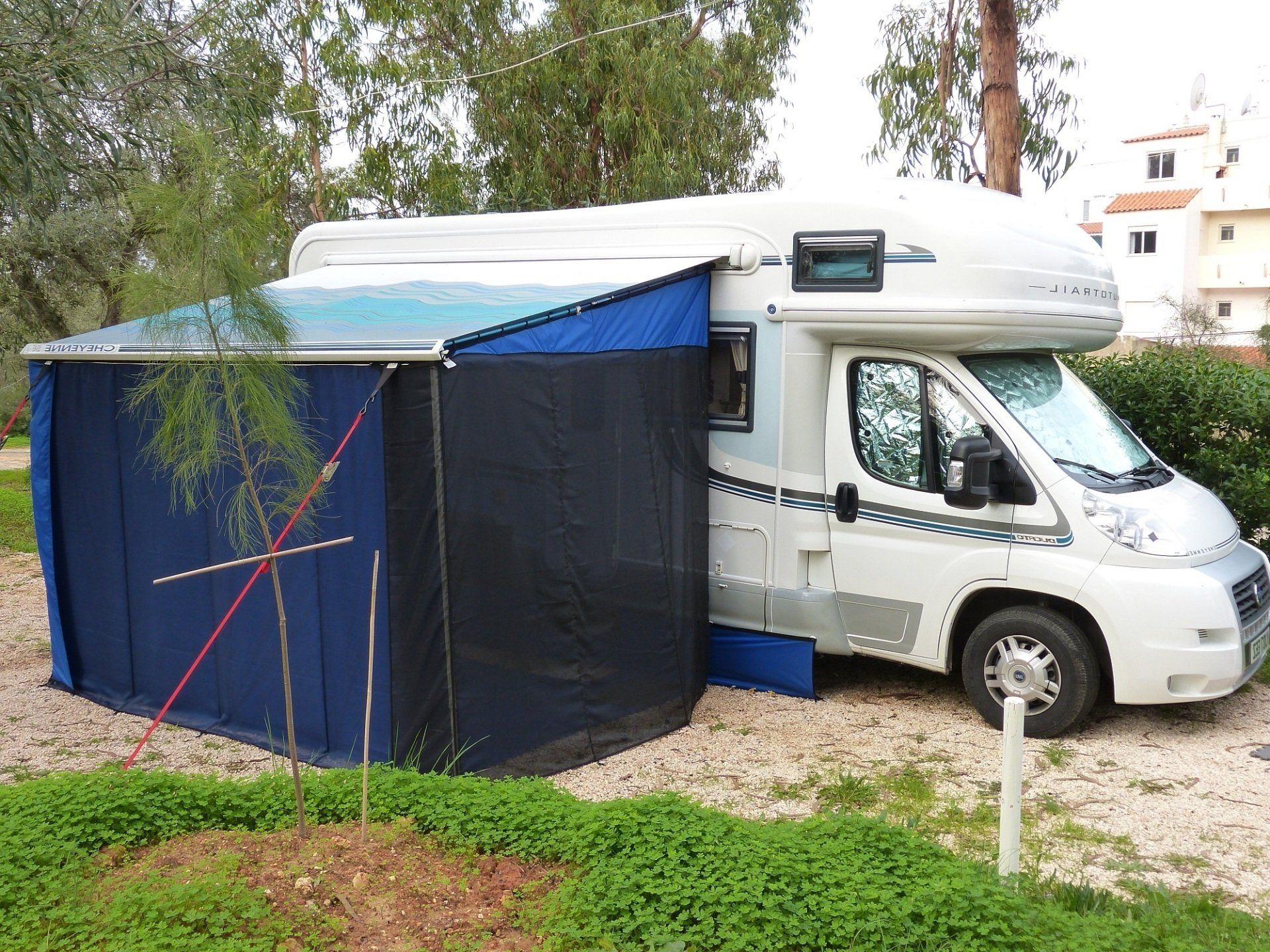 Open windbreaker at front of caravan, open