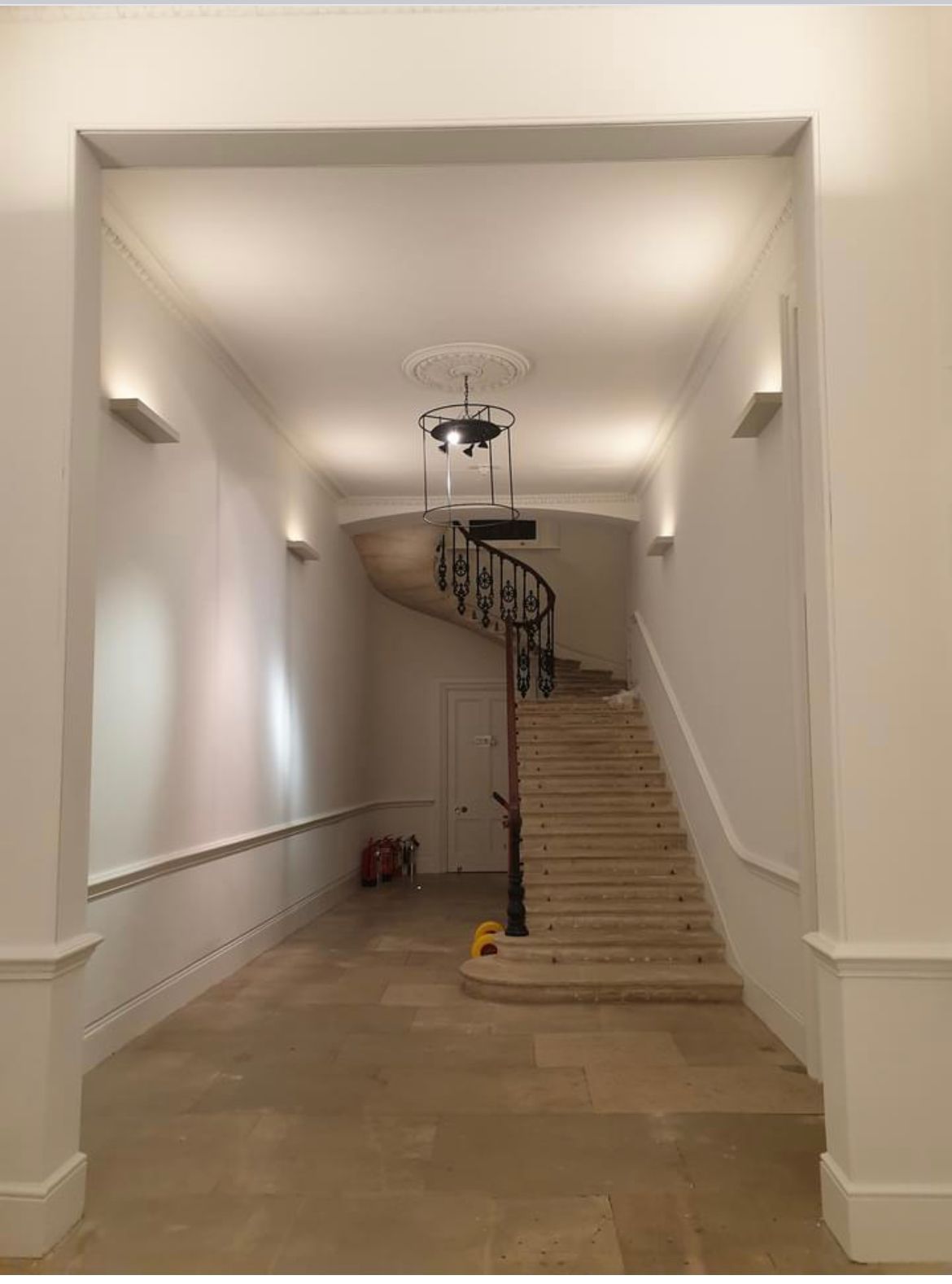 Picture of a large hallway, staircase and landing painted by painters and decorators London