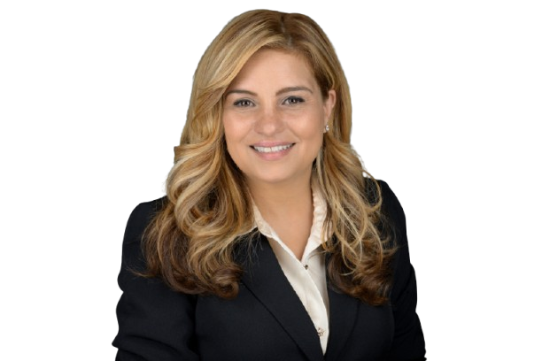Smiling professional in a black blazer and white blouse on a white background