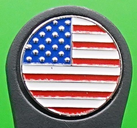 American flag emblem in a circle. Red, white, and blue colors.