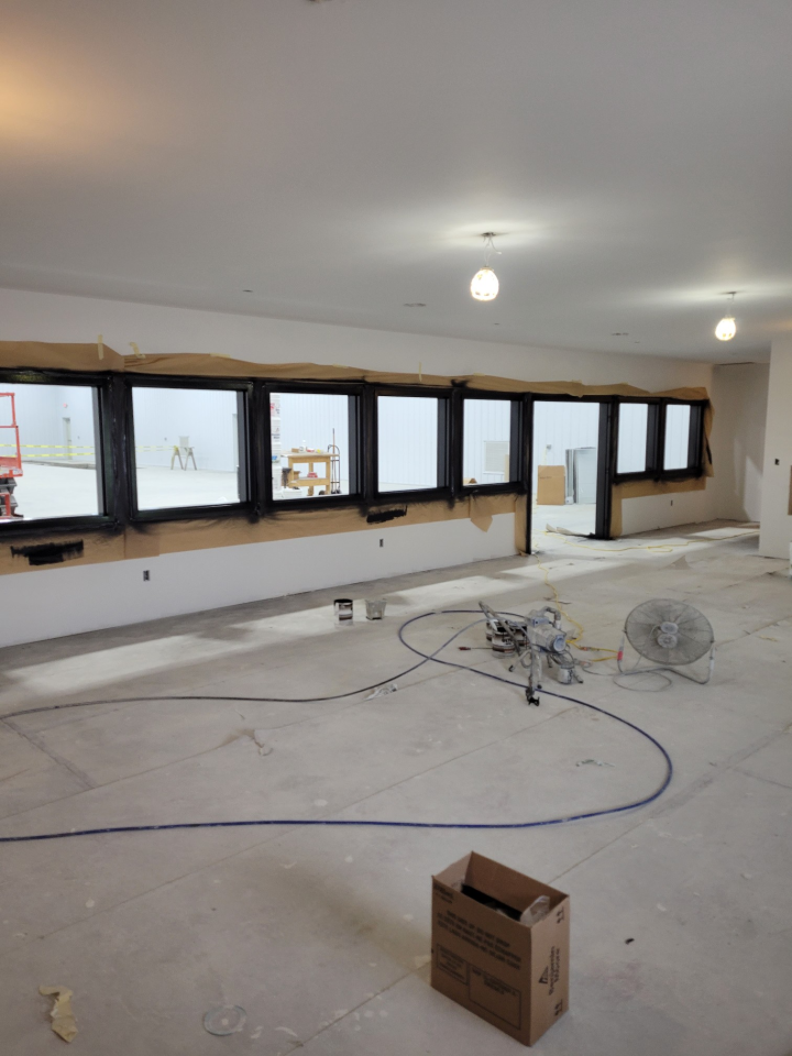 Large Room with Lots of Windows and a Box on the Floor — St Cloud, MN — Fine Line Paint LLC