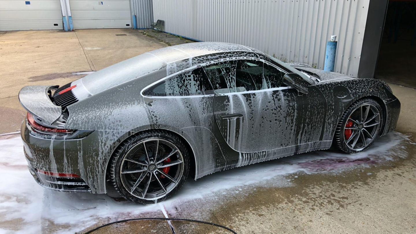Porsche 911 receiving an exterior wash