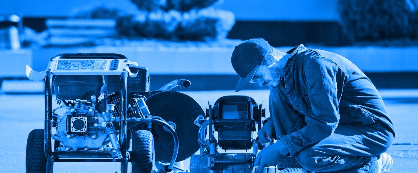 Man Checking Fuel Truck Pipeline