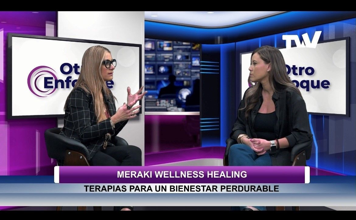 Two women in a TV studio discuss 