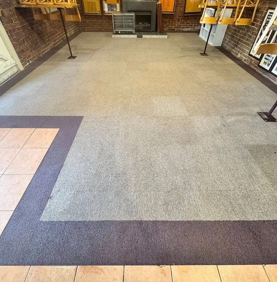 A Freshly Cleaned Carpet In A Hotel Bar — Cobra's Carpet Cleaning in Temora, NSW