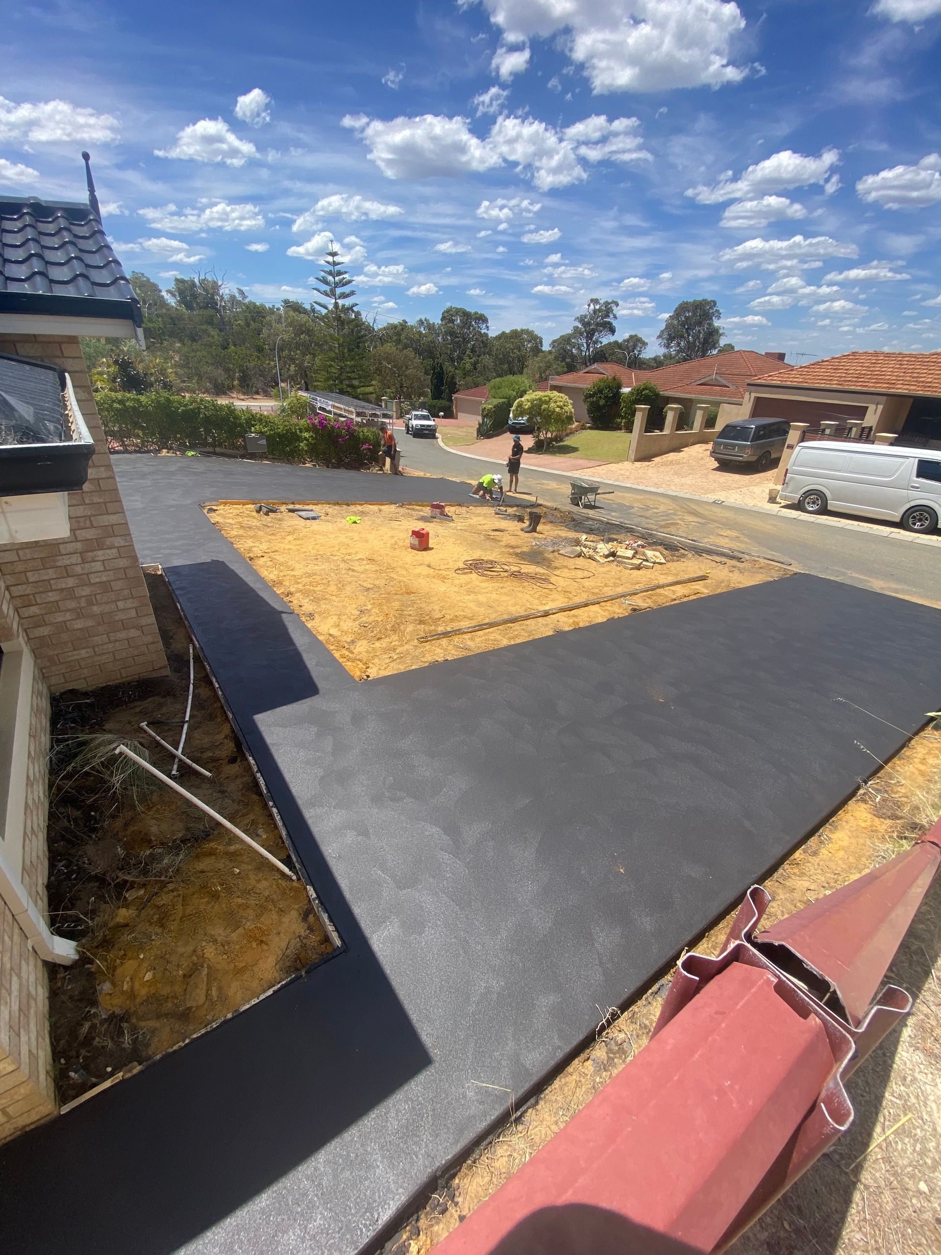 Charcoal grey colour double driveway for two storey home in Baldivis