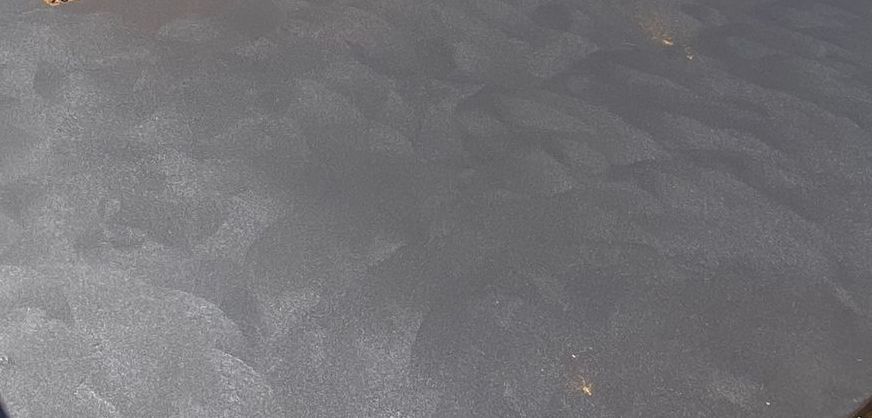 charcoal coloured concrete close up by Rockingham Concreting Co