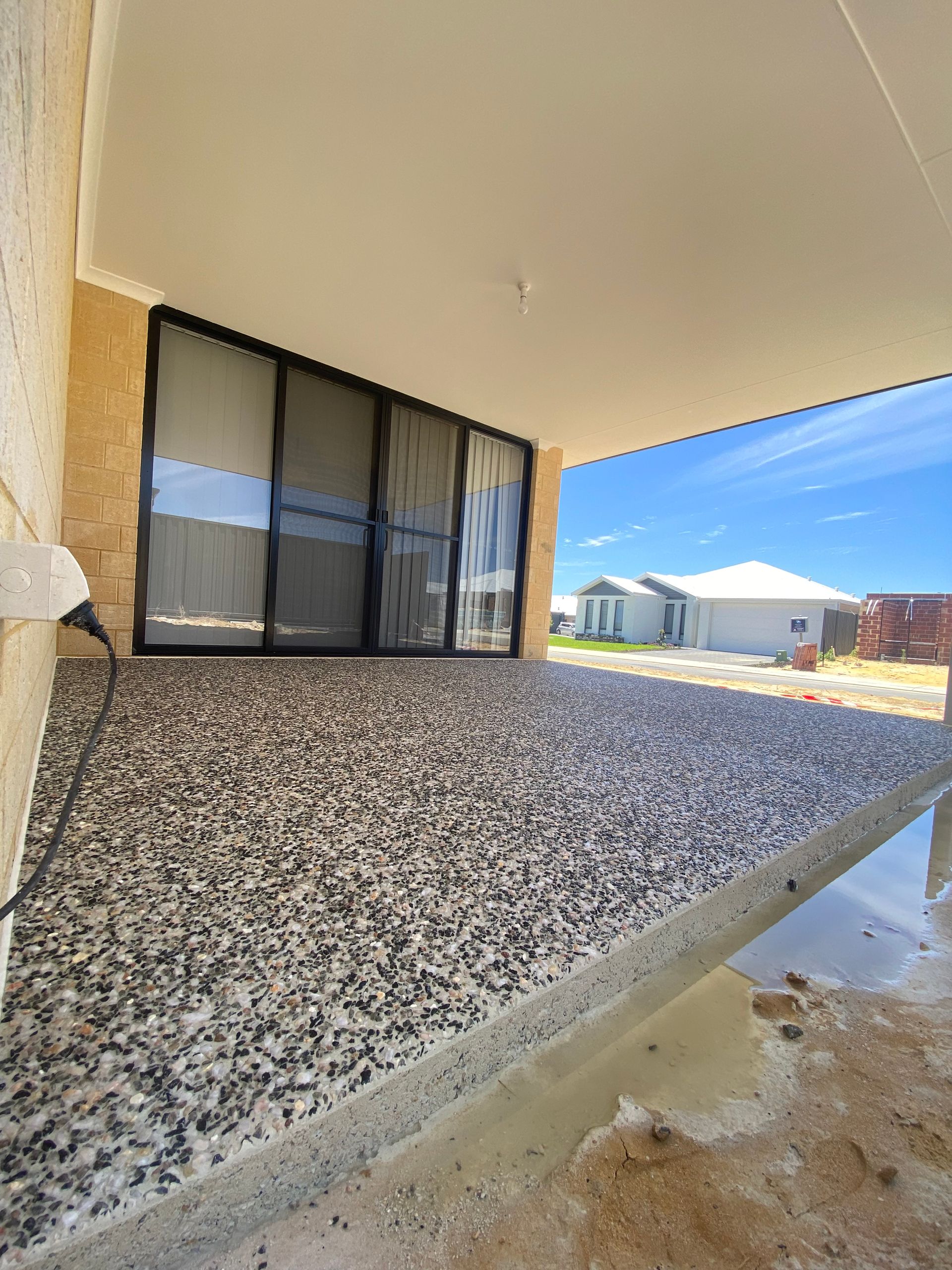 exposed aggregate driveway Decorative Concrete Garage