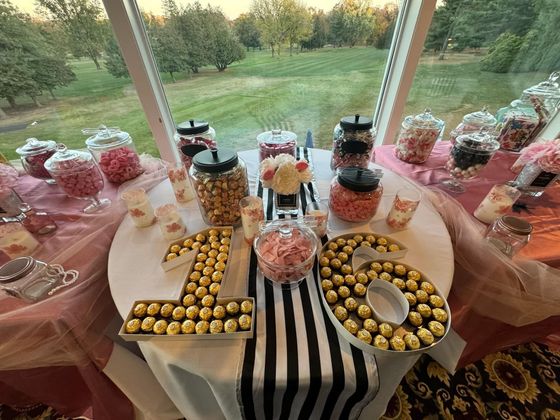 A table with candy and a number 16 on it.