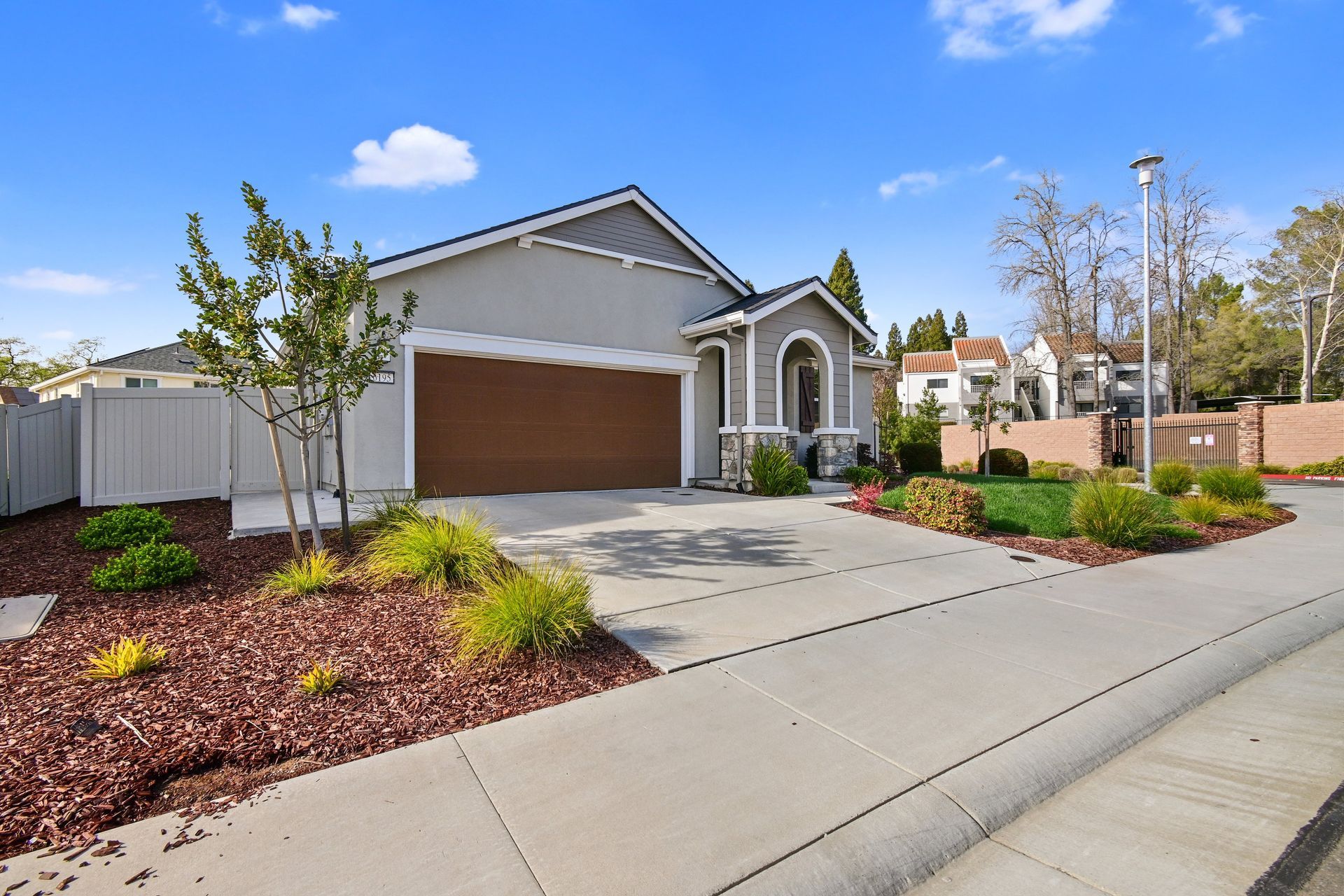 Curbside view of a single-story Citrus Heights home with a manicured yard, promoted by Nicole Spencer - GUIDE Real Estate.