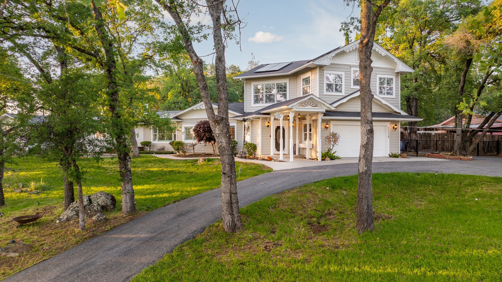 Classic two-story home with wraparound porch listed by a top real estate agent in Auburn, CA.