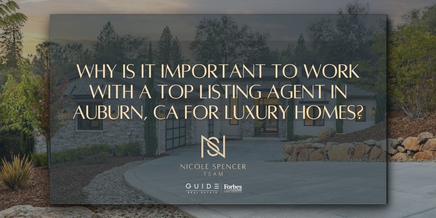 Luxury home exterior with landscape, driveway, and branding for Nicole Spencer - GUIDE Real Estate.