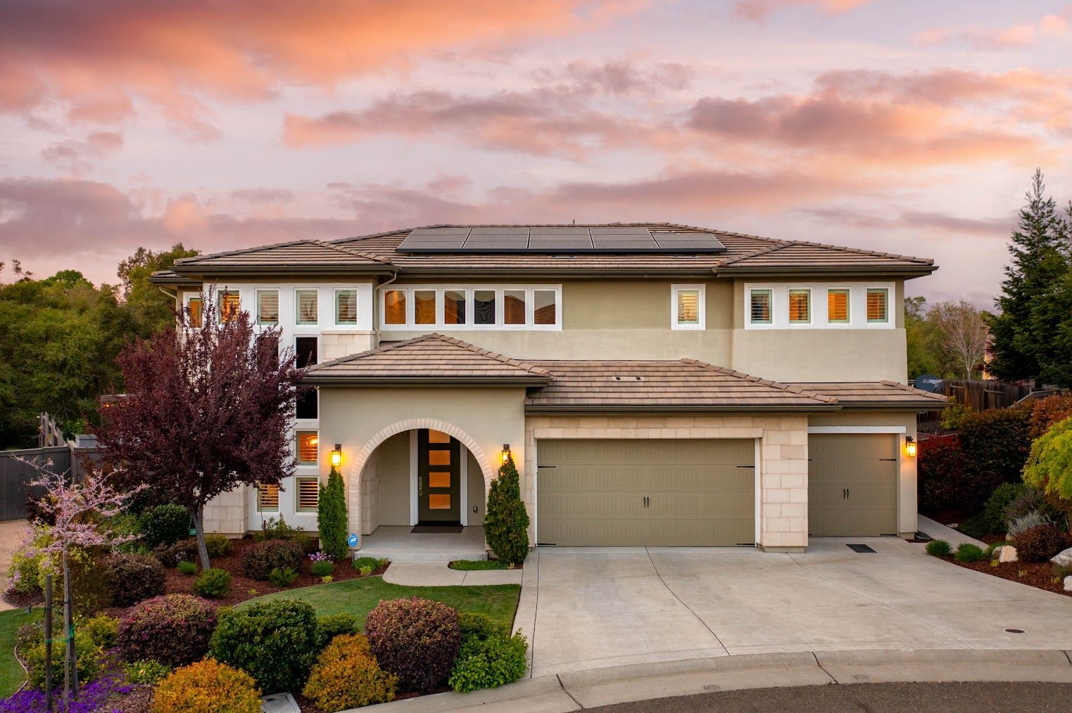 Aerial view of Rocklin residential neighborhood with tree-lined streets and open green spaces.

