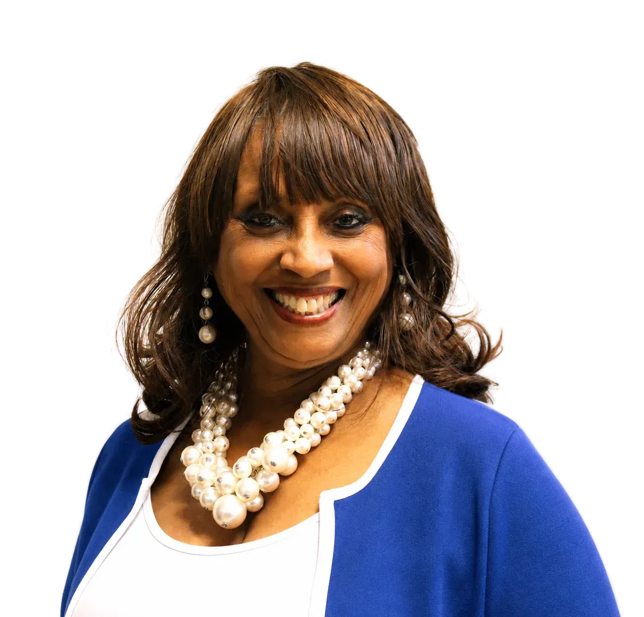 Debbie Meyers-Martin in a blue cardigan and pearl necklace against a white background