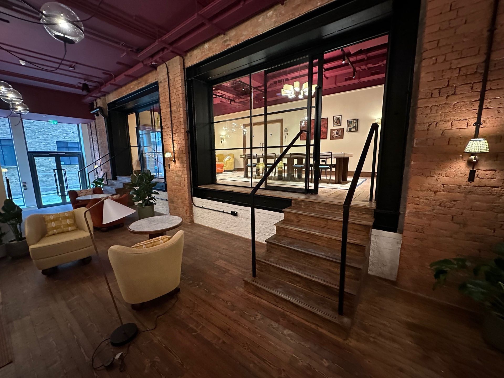 Wooden stairs leading up to the second floor of the building.