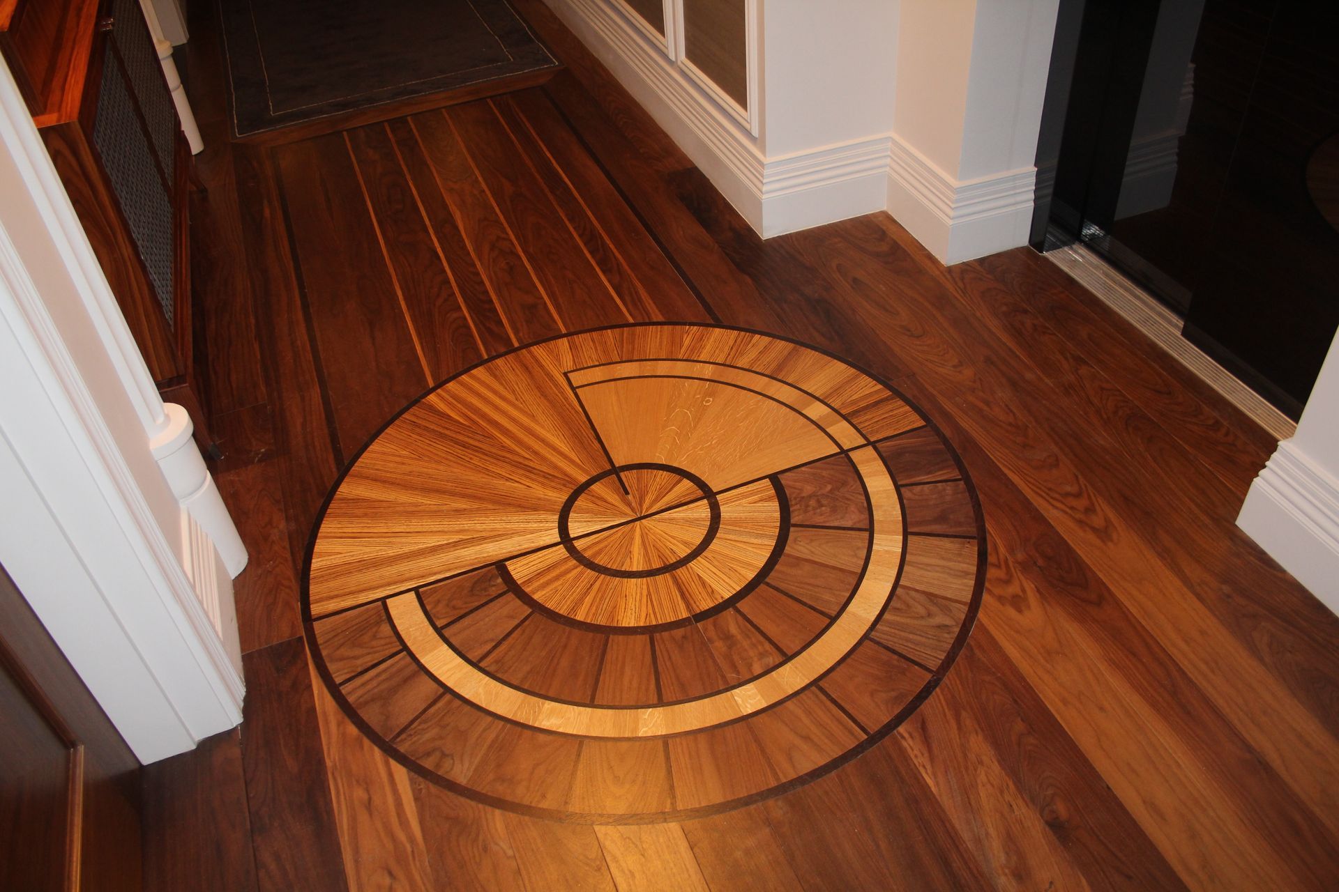 Circular design in prime grade walnut at The Arts Club in Mayfair