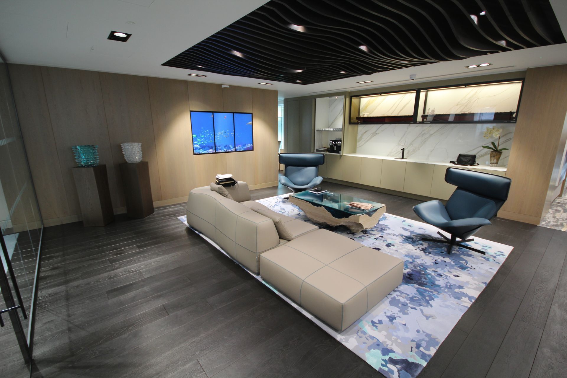 Matt Black Oiled Finish flooring in lounge at Sloane Street
