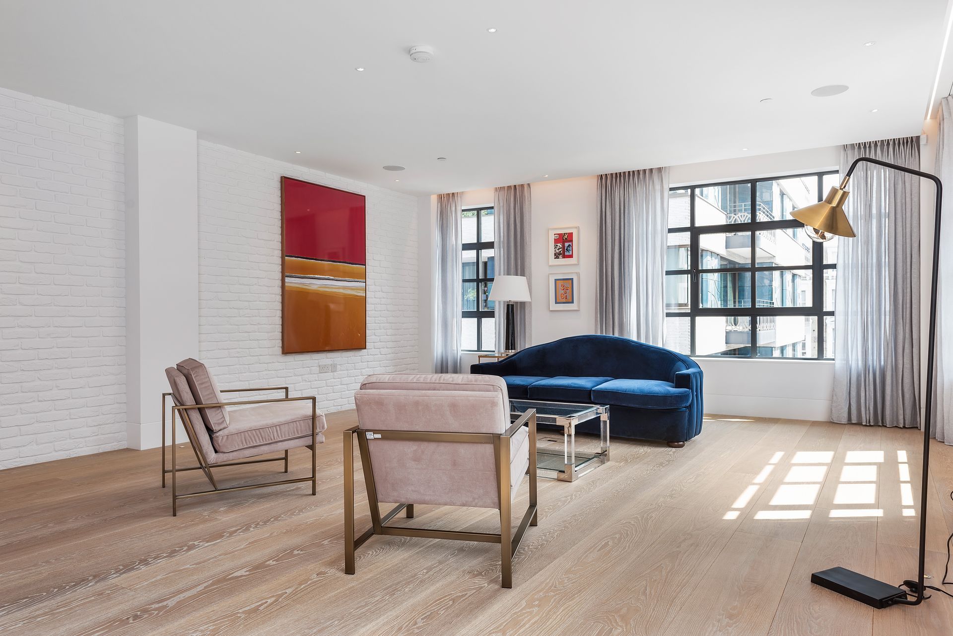Lounge area at Westbourne Lofts fitted with a Brushed and Bespoke Coloured Oil flooring