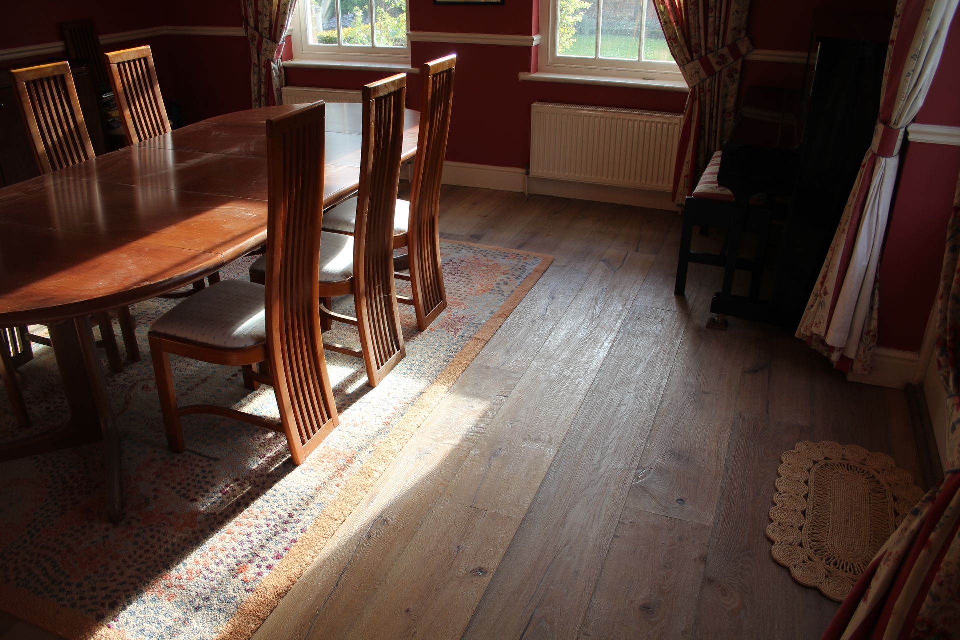 Dining room at Great Easton Residence fitted with Mock Reclaimed Oiled Oak flooring