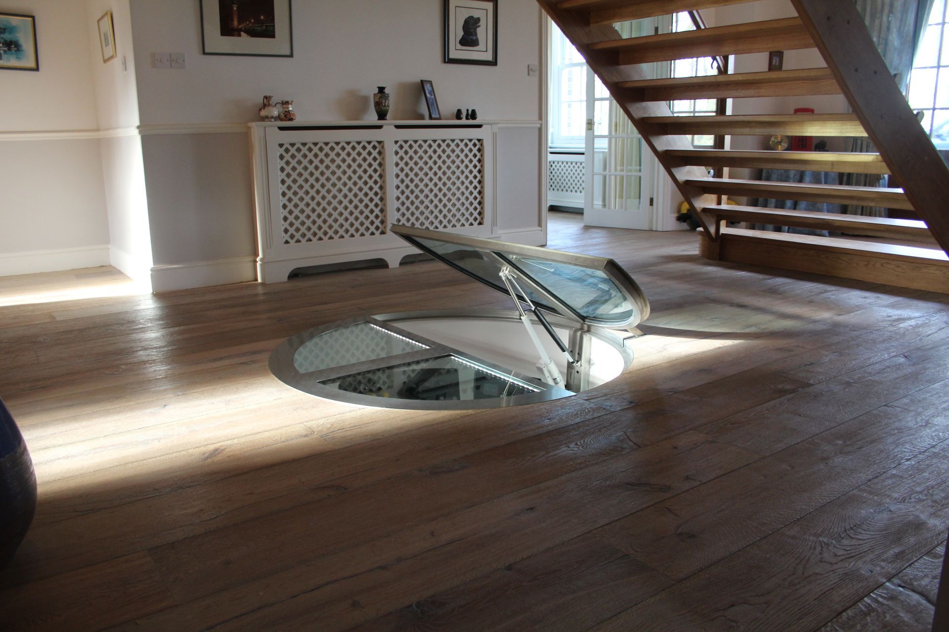 Open Wine cellar surrounded by Mock Reclaimed Oiled Oak flooring