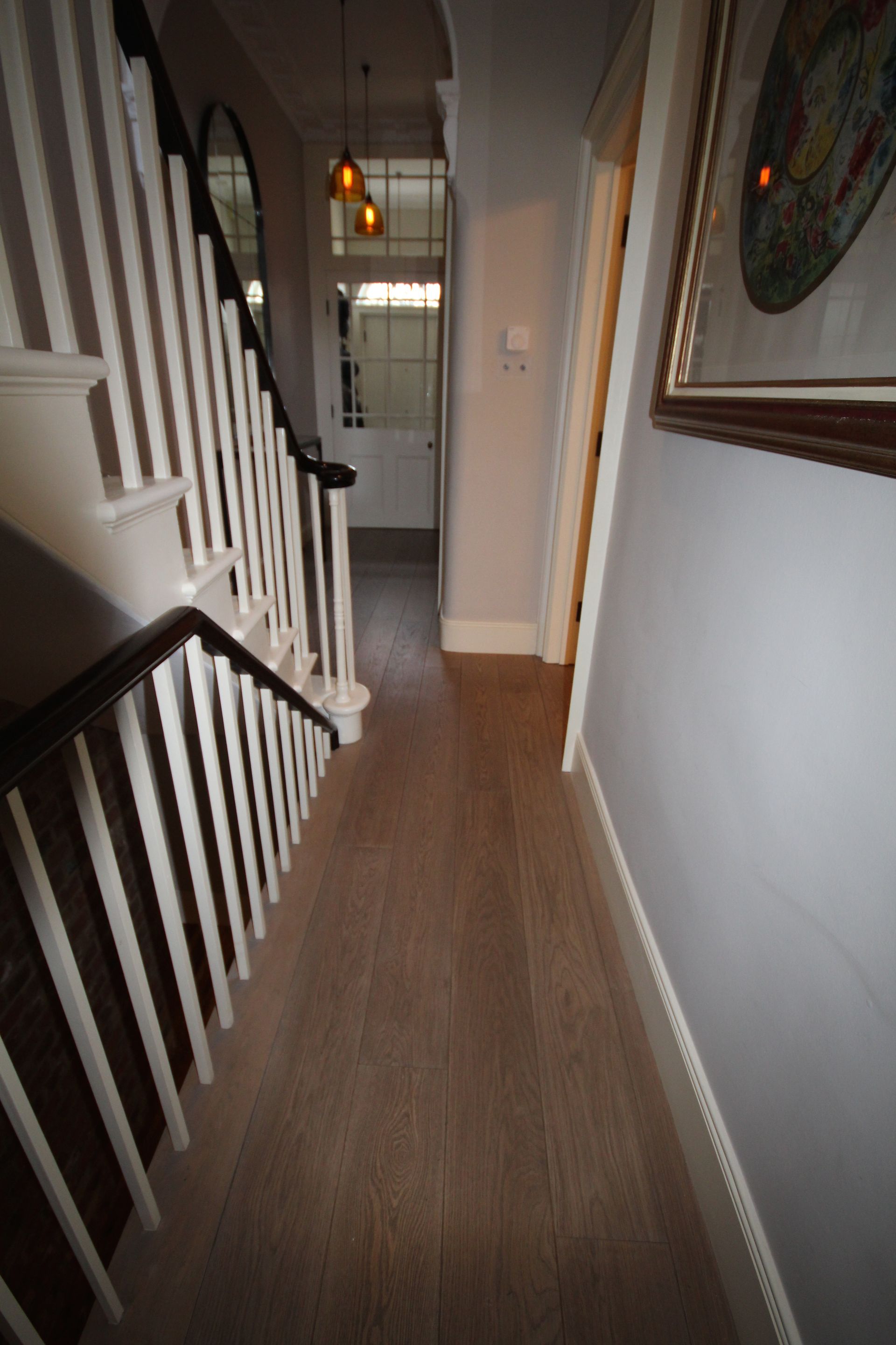 Hallway with Smoked Prime Grade Oak with Oil Finished flooring at Holland Park