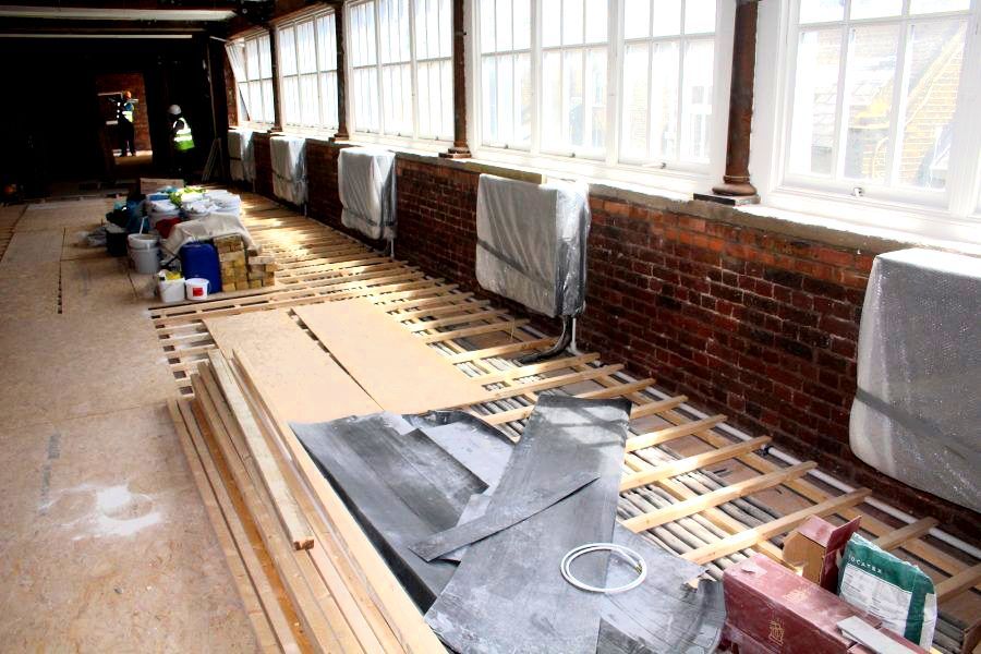 Flooring getting fitted at client site, extending the life
