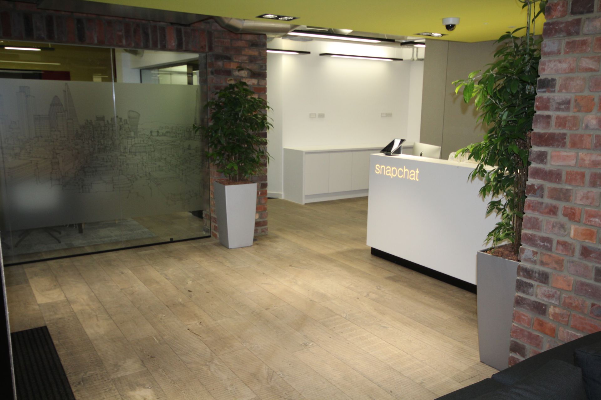 Reception at Snapchat in London fitted with a Smoked Oak Finish flooring
