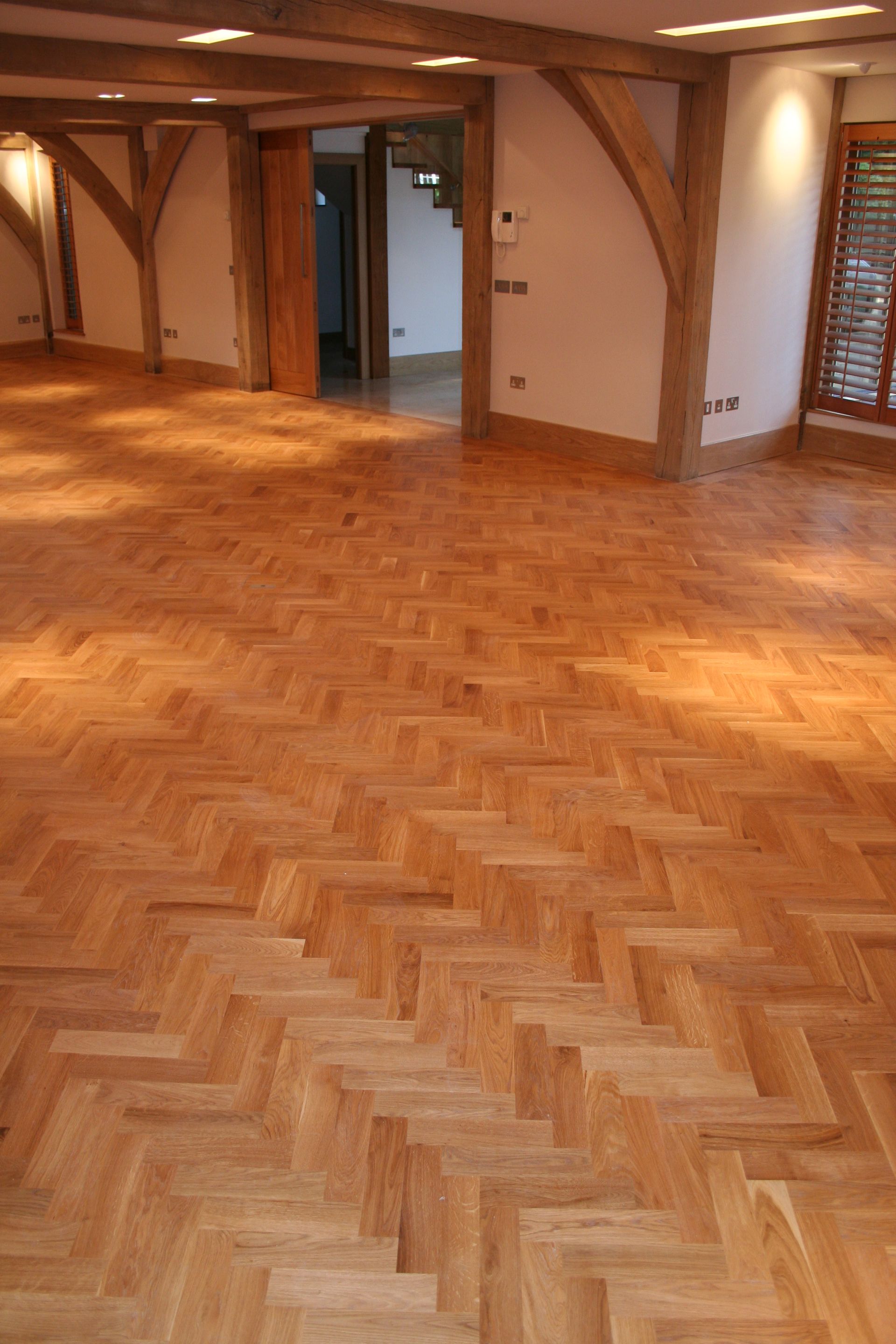 Open plan room with Oak Parquet flooring design in Pinner