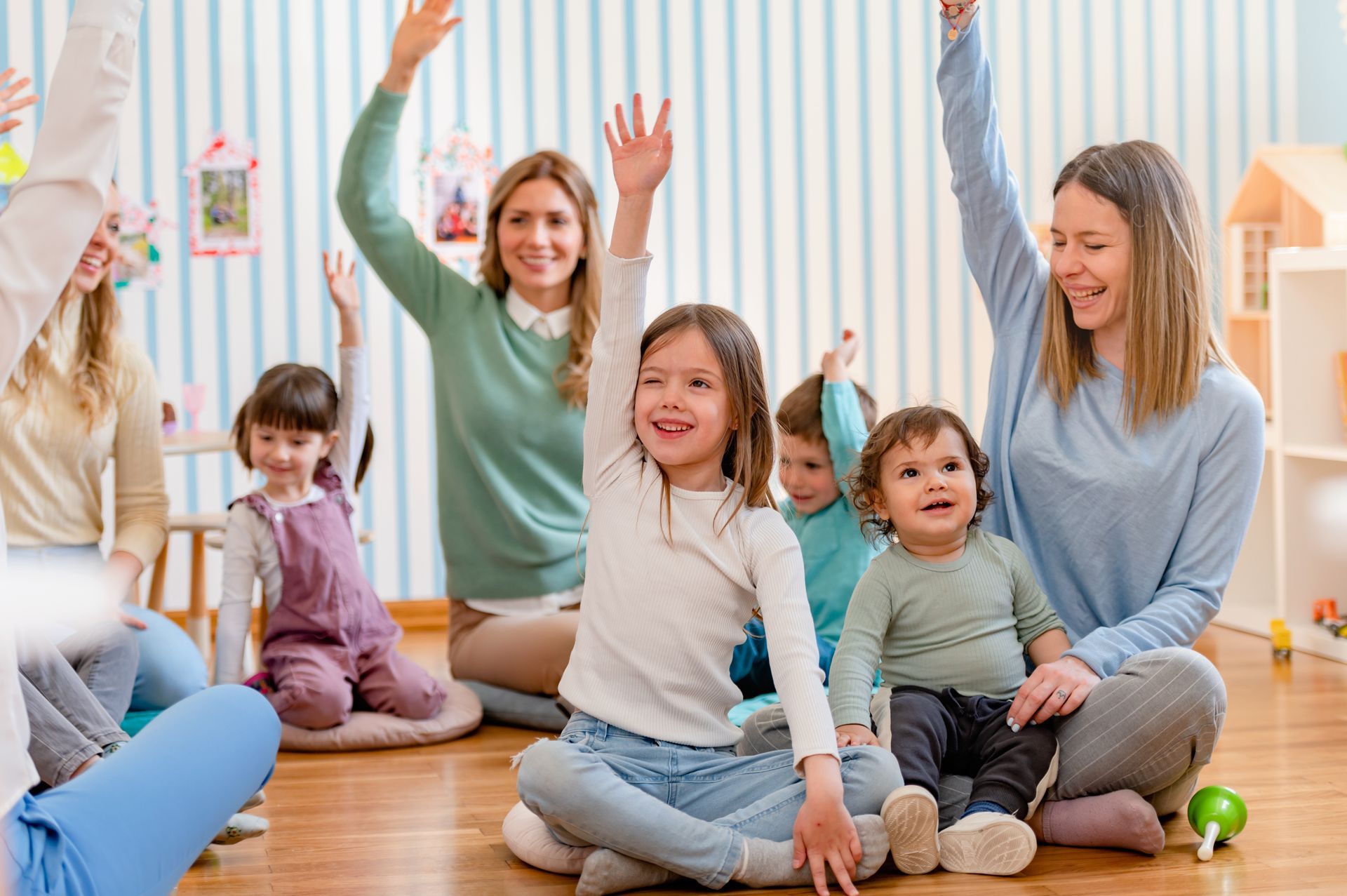 Parents taking part in the activities for preschool children