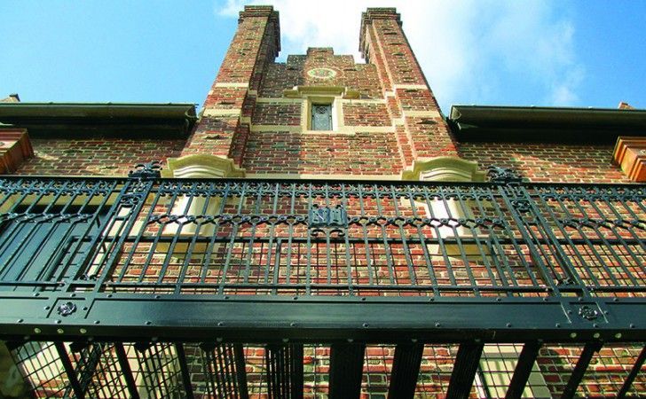 Hand-crafted code-compliant fire escape and cast iron restoration at Harvard Lampoon Building — Cambridge, MA by Cenaxo