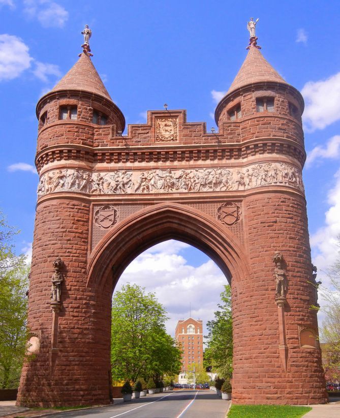 Soldiers & Sailors Memorial Arch after Cenaxo restoration — brownstone masonry, terracotta frieze, and conical tower roofs, Hartford CT