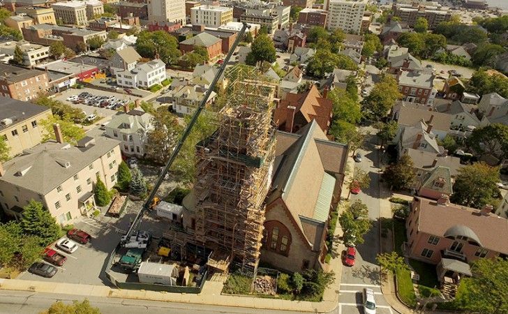 Aerial view of Grace Episcopal Church during Cenaxo's 130-foot steeple restoration — H.H. Richardson church in New Bedford, MA