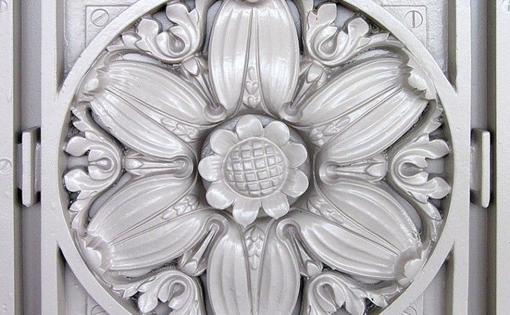 Restored cast iron rosette medallion at Travelers Tower — original 1919 neoclassical ornament by Donn Barber, Hartford CT restoration by Cenaxo