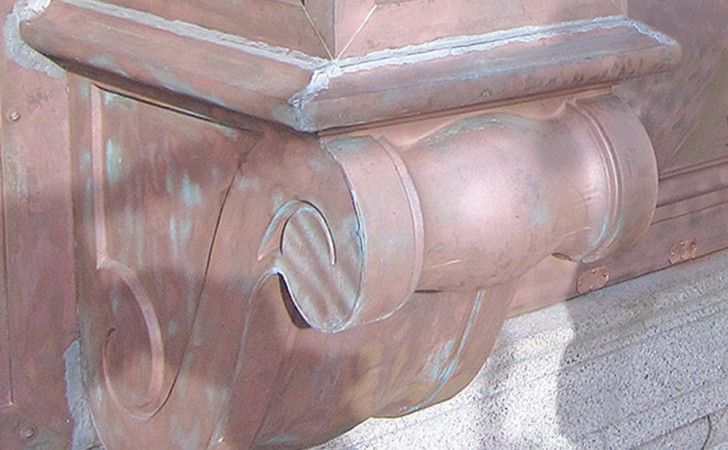 Decorative copper bracket with scroll detail restoration at Travelers Tower — Hartford, CT by Cenaxo