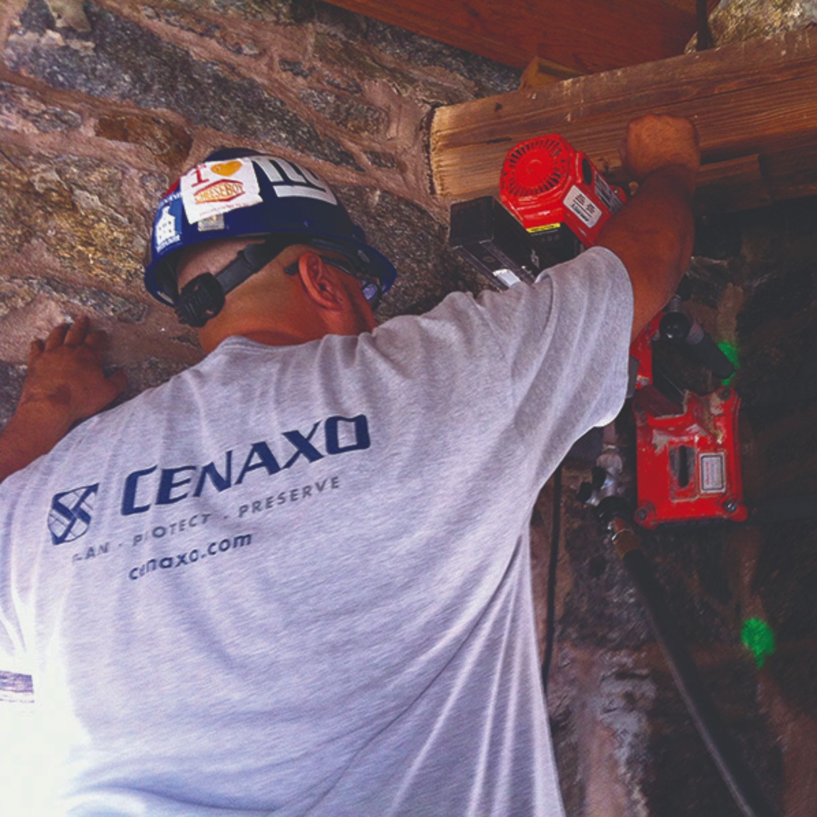 Cenaxo craftsman performing historic masonry restoration on a stone wall — Connecticut