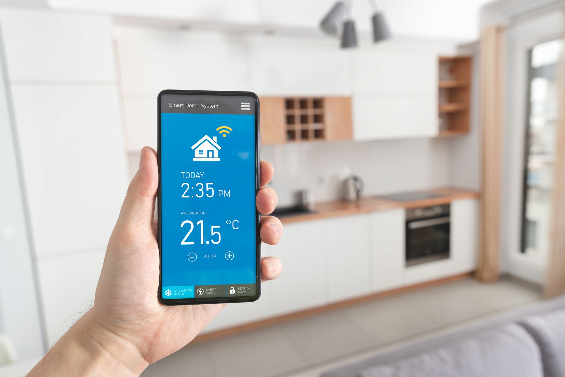 Hand holding a smart phone.