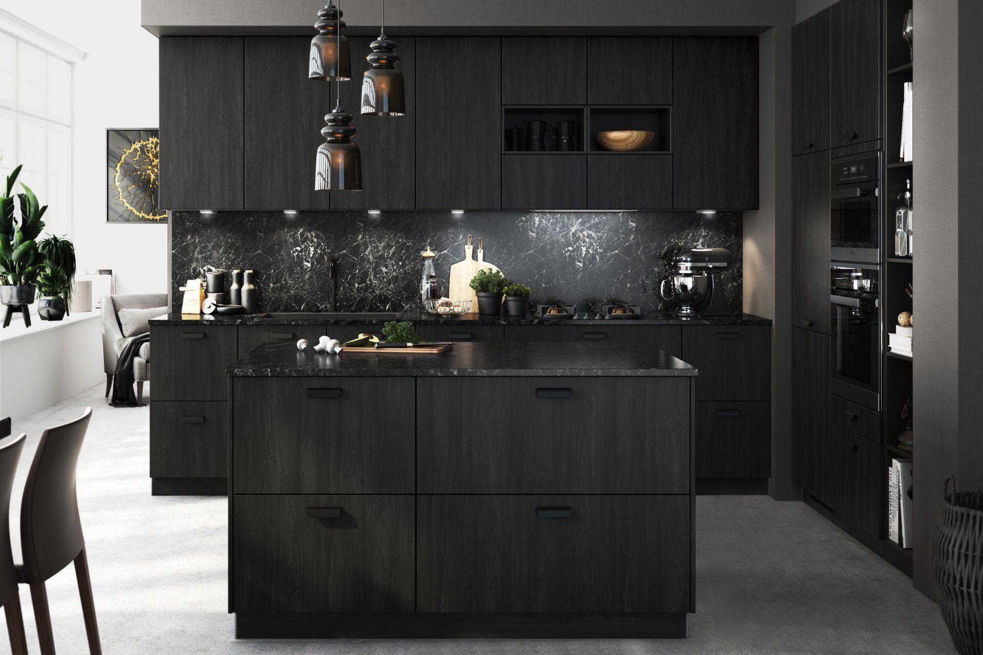 A kitchen with black cabinets and a large island in the middle.