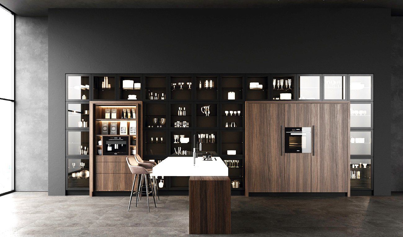 A kitchen with wooden cabinets and a large island in the middle