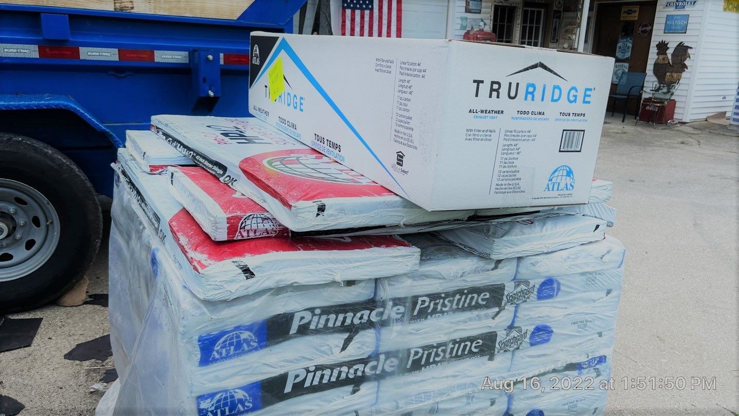 Asphalt shingles on a pallet awaiting installation