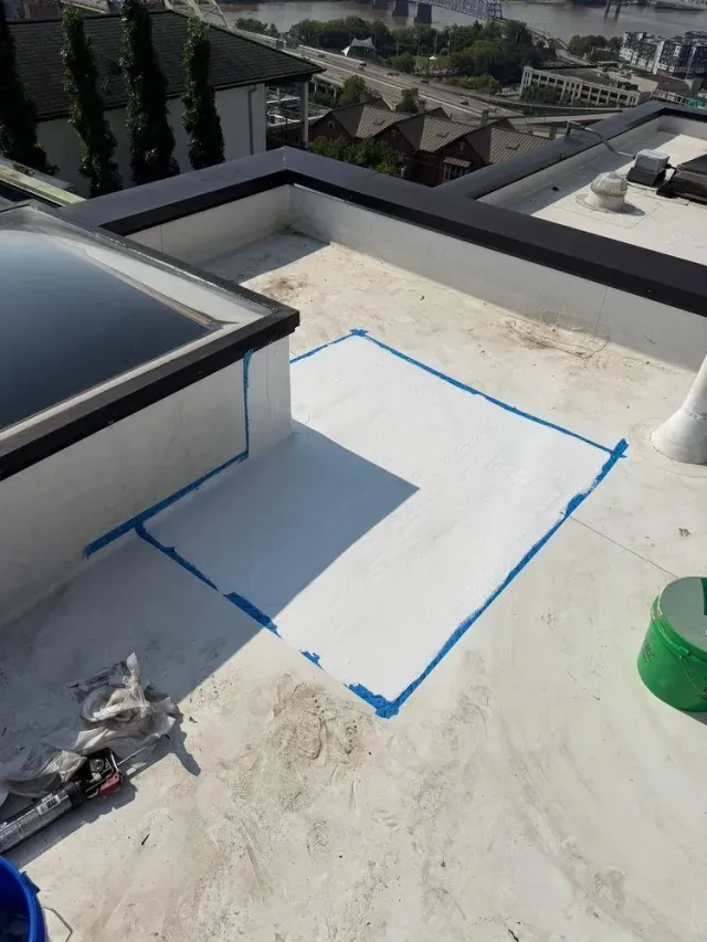 Leak repair area taped off on a membrane flat roof, Mt. Adams, Cincinnati