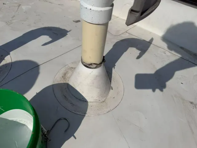Pipe penetration on a membrane flat roof in Mt. Adams, Cincinnati