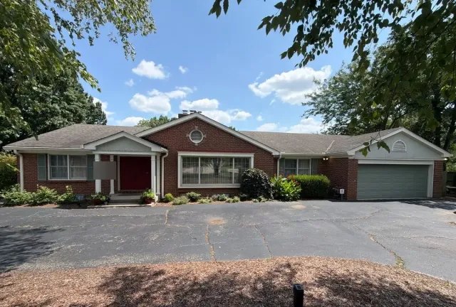 Mt. Airy, Cincinnati brick ranch before its wind and hail insurance roof replacement
