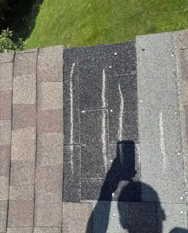 Chalk-marked hail and wind damage on asphalt shingles, Mt. Airy, Cincinnati