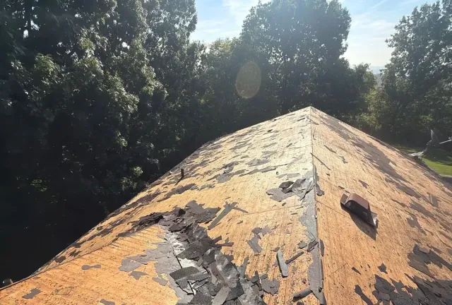Old shingles torn off down to the roof deck on a Mt. Airy, Cincinnati home