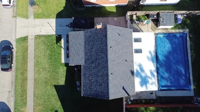Finished CertainTeed Landmark PRO roof in Moire Black, White Oak, Cincinnati
