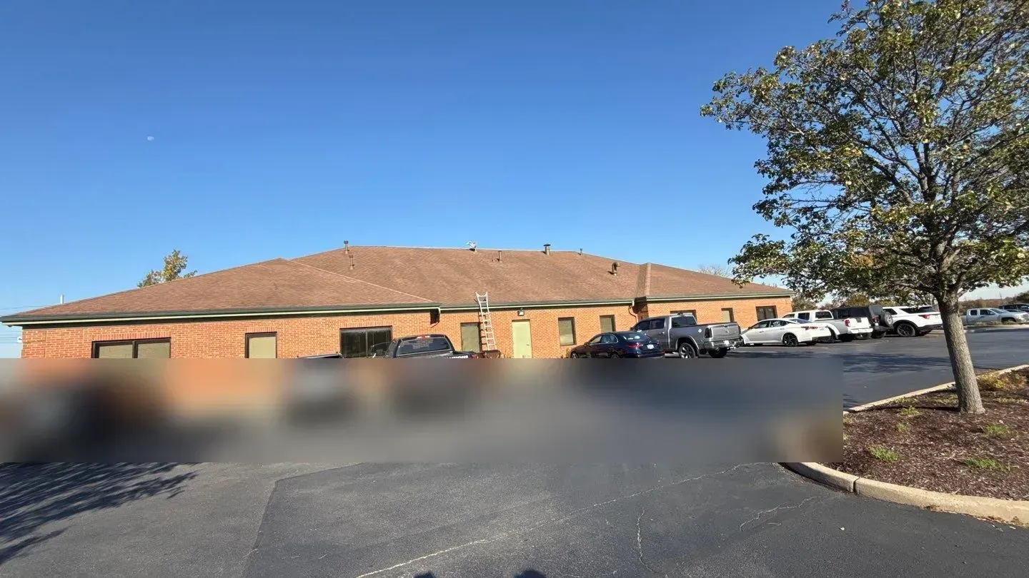 Florence, KY office building off Burlington Rd before its wind damage roof replacement