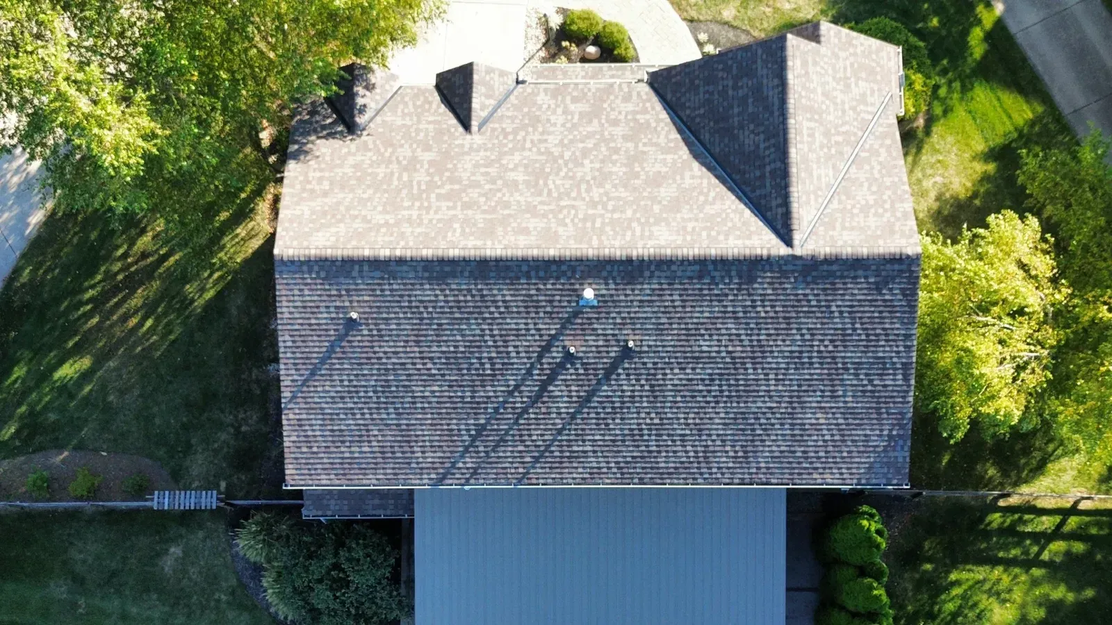 Drone view of a finished CertainTeed Landmark PRO Prairie Wood roof in Florence, KY